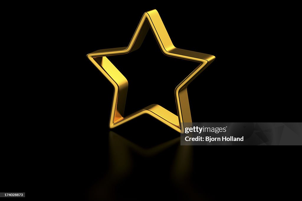 Golden Star on black reflective background