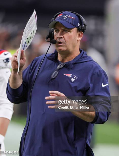 Offensive coordinator Bill O'Brien of the New England Patriots talks to players in the fourth quarter of a game against the Las Vegas Raiders at...