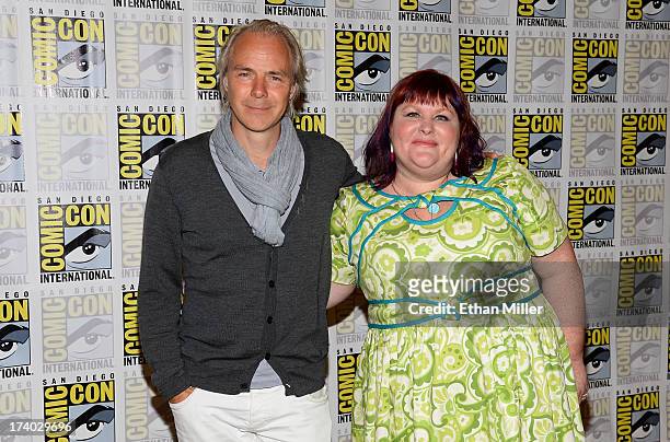Director Harald Zwart and author Cassandra Clare attend "The Mortal Instruments: City of Bones" press line during Comic-Con International 2013 at the...