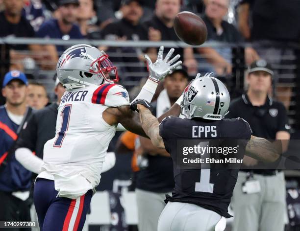 Wide receiver DeVante Parker of the New England Patriots attempts to catch a pass against safety Marcus Epps of the Las Vegas Raiders in the fourth...