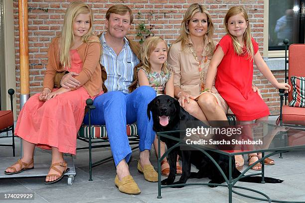 King Willem-Alexander, Queen Maxima, Princess Catharina-Amalia, Princess Alexia and Princess Ariane with their dog 'Skipper' pose during the annual...