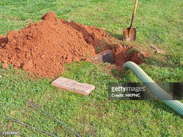open septic tank in yard while bring pumped out - poisonous stock pictures, royalty-free photos & images