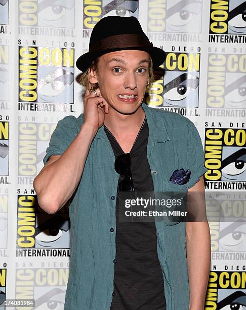 Actor Jamie Campbell Bower attends "The Mortal Instruments: City of Bones" press line during Comic-Con International 2013 at the Hilton San Diego...