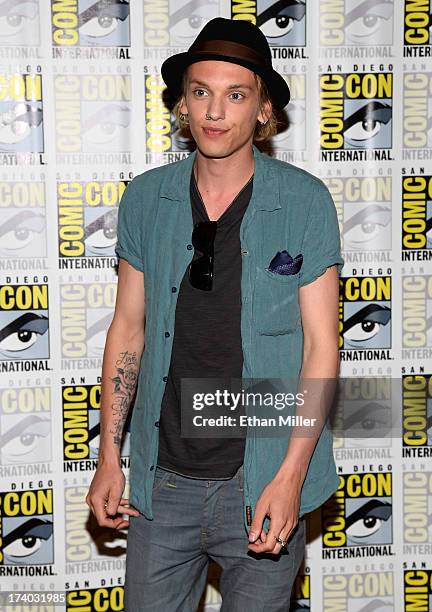 Actor Jamie Campbell Bower attends "The Mortal Instruments: City of Bones" press line during Comic-Con International 2013 at the Hilton San Diego...