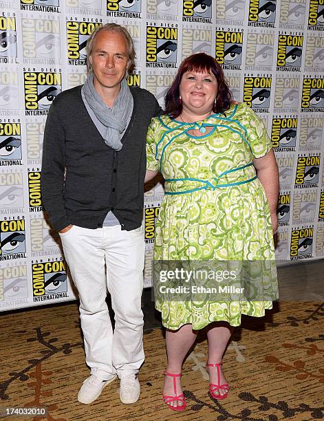 Director Harald Zwart and author Cassandra Clare attend "The Mortal Instruments: City of Bones" press line during Comic-Con International 2013 at the...