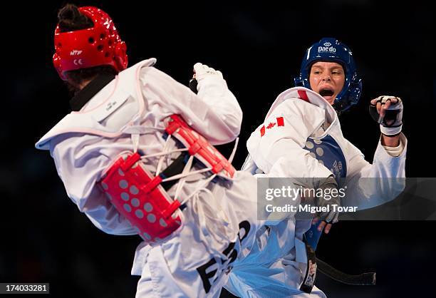 Elena Gomez of Spain competes with Jasmine Vokey of Canada during the women's -73 kg combat of WTF World Taekwondo Championships 2013 at the...