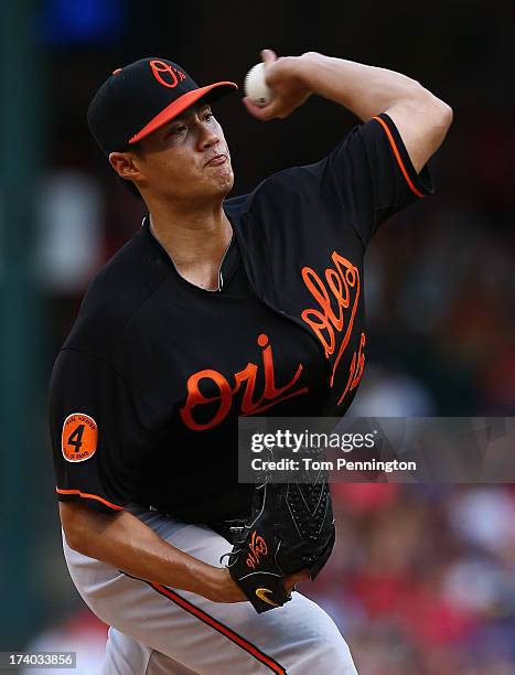 Wei-Yin Chen of the Baltimore Orioles pitches against the Texas Rangers in the bottom of the first inning at Rangers Ballpark in Arlington on July...