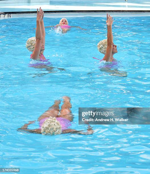 View of Synchronized swimming at the Esther Williams cocktail reception during Mercedes-Benz Fashion Week Swim 2014 at The Raleigh on July 19, 2013...