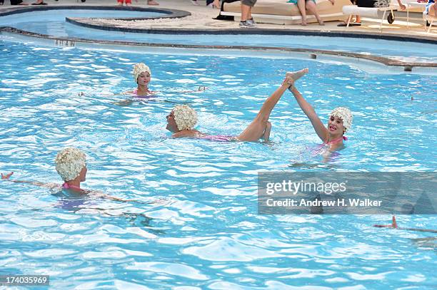 View of Synchronized swimming at the Esther Williams cocktail reception during Mercedes-Benz Fashion Week Swim 2014 at The Raleigh on July 19, 2013...