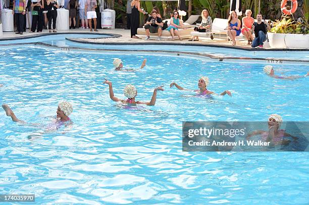 View of Synchronized swimming at the Esther Williams cocktail reception during Mercedes-Benz Fashion Week Swim 2014 at The Raleigh on July 19, 2013...