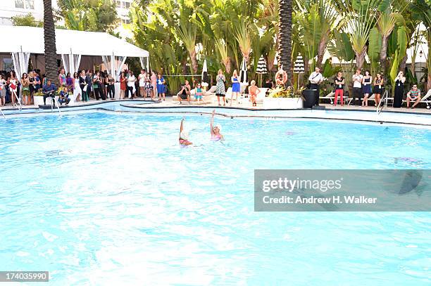 View of Synchronized swimming at the Esther Williams cocktail reception during Mercedes-Benz Fashion Week Swim 2014 at The Raleigh on July 19, 2013...