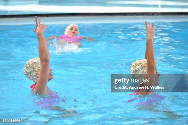 View of Synchronized swimming at the Esther Williams cocktail reception during Mercedes-Benz Fashion Week Swim 2014 at The Raleigh on July 19, 2013...