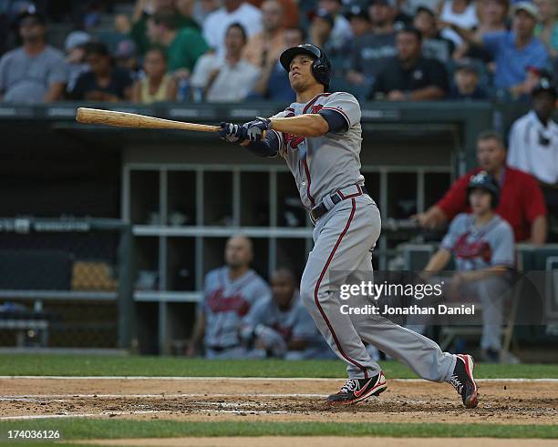 Andrelton Simmons of the Atlanta Braves hits a two-run home run in the 2nd inning against the Chicago White Sox at U.S. Cellular Field on July 19,...