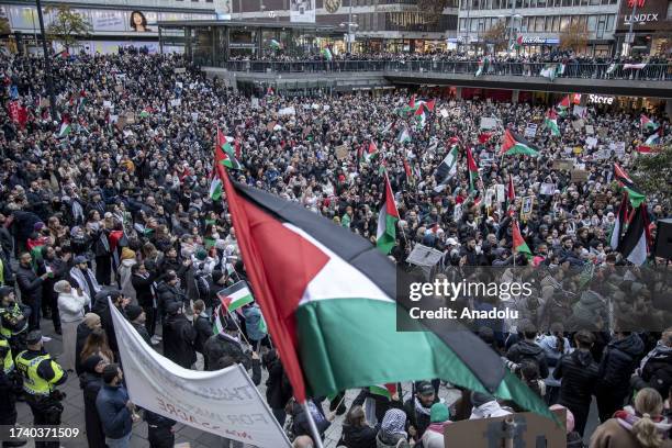 Thousands of pro-Palestinian protestors gather as they demonstrate against Israeli war on Gaza calling for a ceasefire at Sergelstorg Square in...