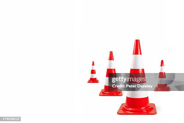 arrangement of traffic bollards with copy space - safety cone stock pictures, royalty-free photos & images