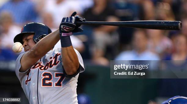 Jhonny Peralta of the Detroit Tigers fouls tips the ball during the fifth inning in a game against the Kansas City Royals at Kauffman Stadium on July...