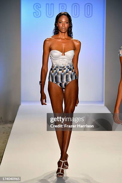 Model walks the runway at the Suboo show during Mercedes-Benz Fashion Week Swim 2014 at Oasis at the Raleigh on July 19, 2013 in Miami, Florida.