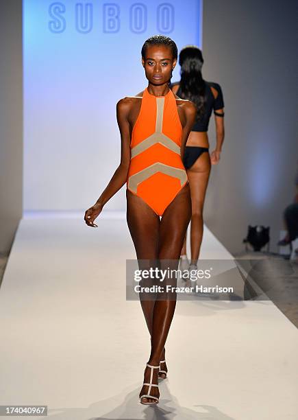 Model walks the runway at the Suboo show during Mercedes-Benz Fashion Week Swim 2014 at Oasis at the Raleigh on July 19, 2013 in Miami, Florida.