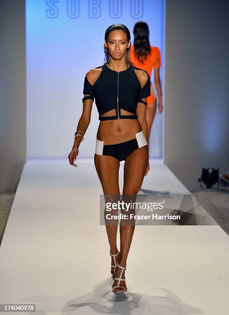 Model walks the runway at the Suboo show during Mercedes-Benz Fashion Week Swim 2014 at Oasis at the Raleigh on July 19, 2013 in Miami, Florida.