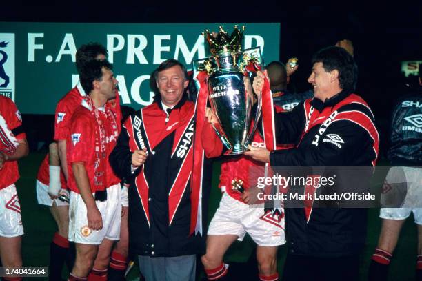 May 1993 Premiership Football - Manchester United v Blackburn Rovers - Happy United manager Alex Ferguson holds the Premiership trophy with his...