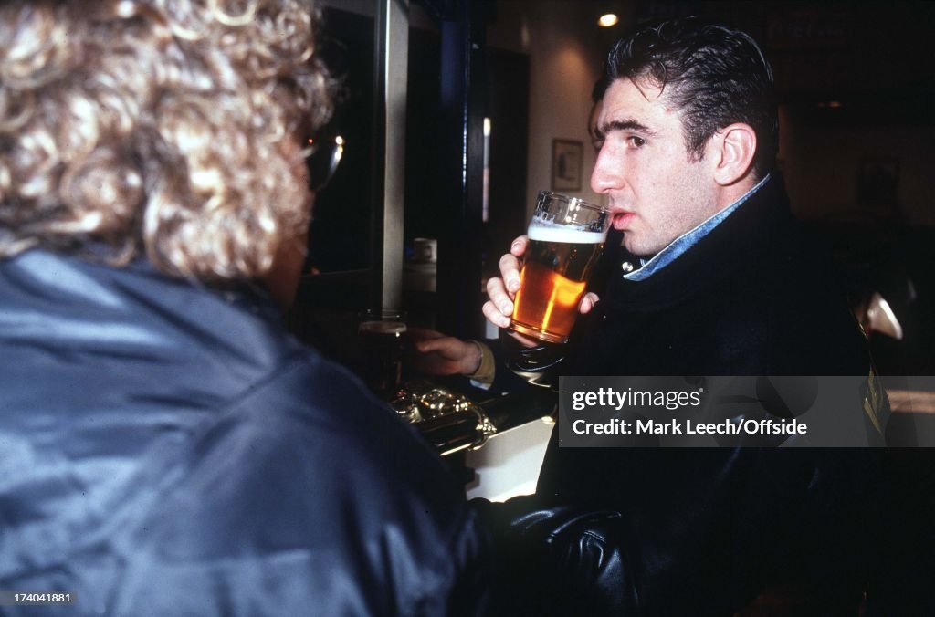 Eric Cantona Drinking Beer