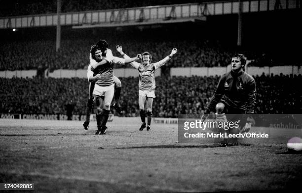 November 1983 Football League Cup - Tottenham Hotspur v Arsenal - Tottenham goalkeeper Ray Clemence kneels in dejection as Arsenal celebrate a goal...