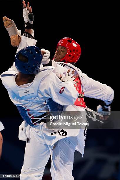 Lutalo Muhammad of Great Britain competes with Rafael Castillo of Cuba during a men's -87 kg combat of WTF World Taekwondo Championships 2013 at the...