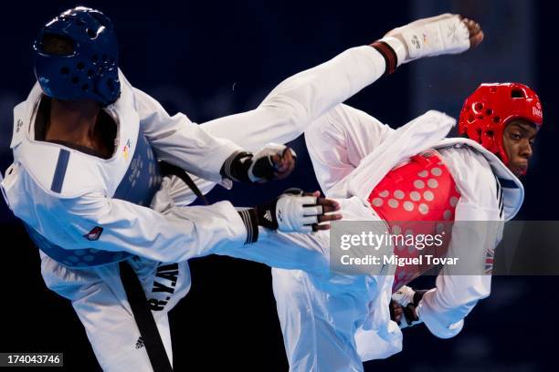 Lutalo Muhammad of Great Britain competes with Rafael Castillo of Cuba during a men's -87 kg combat of WTF World Taekwondo Championships 2013 at the...