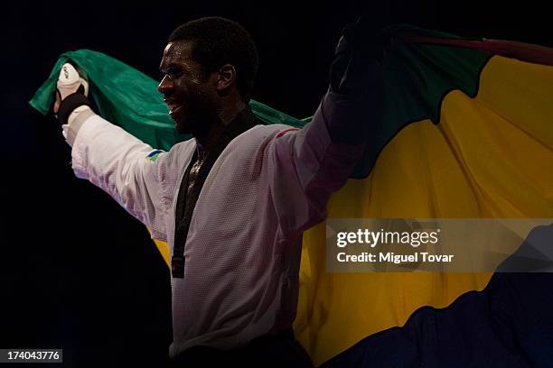 Anthony Obame of Gabon celebrates after winning the gold medal of men's +87 kg combat of WTF World Taekwondo Championships 2013 at the exhibitions...