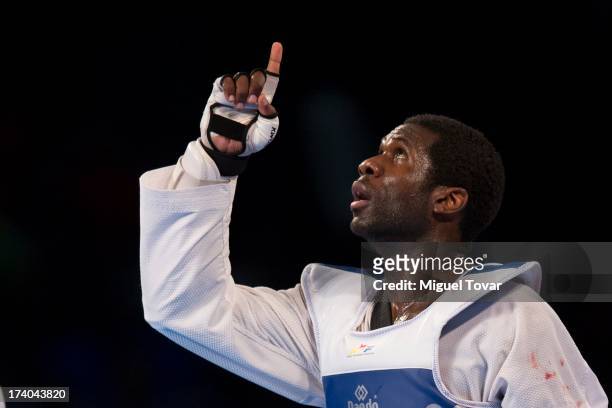 Anthony Obame of Gabon celebrates after winning the gold medal of men's +87 kg combat of WTF World Taekwondo Championships 2013 at the exhibitions...