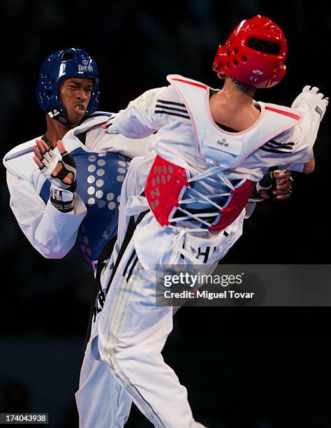 Rafael Castillo of Cuba competes with Mao Zhao Yong of China during the men's -87 kg final combat of WTF World Taekwondo Championships 2013 at the...