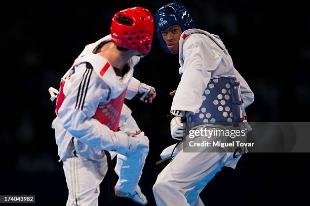 Rafael Castillo of Cuba competes with Mao Zhao Yong of China during the men's -87 kg final combat of WTF World Taekwondo Championships 2013 at the...