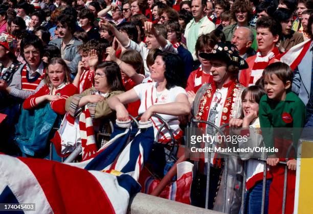 English Football League Division One - Arsenal v Chelsea Arsenal fans wave their flags from the from of the North Bank terrace..