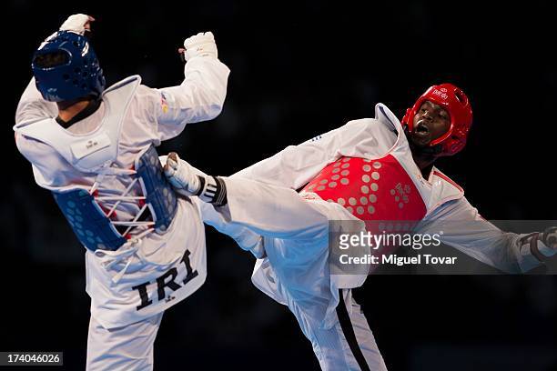 Robelis Despaigner of Cuba competes with Sajjad Mardani of Iran during the +87 kg semifinal combat of WTF World Taekwondo Championships 2013 at the...
