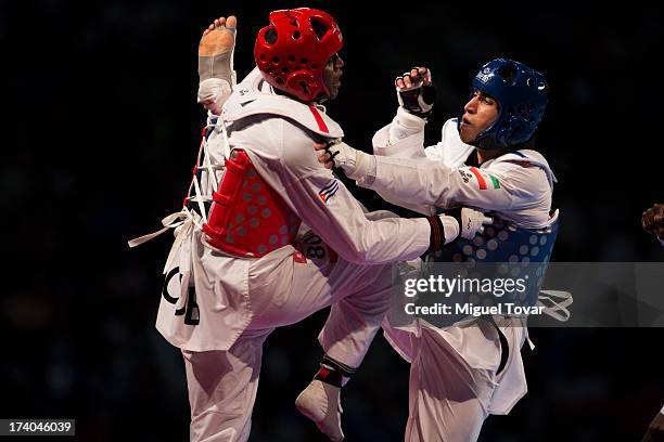 Robelis Despaigner of Cuba competes with Sajjad Mardani of Iran during the +87 kg semifinal combat of WTF World Taekwondo Championships 2013 at the...