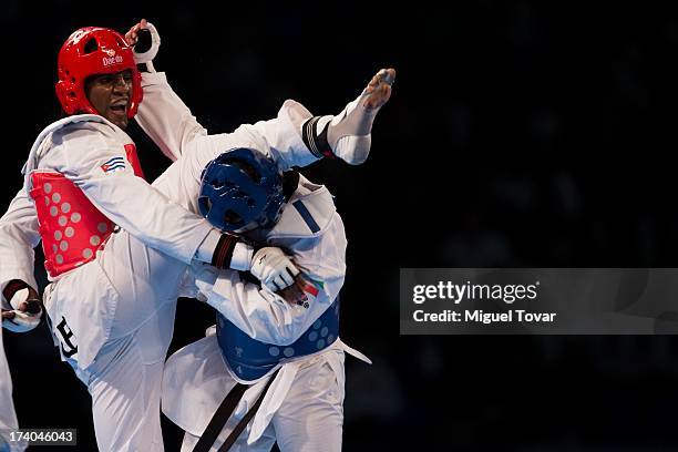 Robelis Despaigner of Cuba competes with Sajjad Mardani of Iran during the +87 kg semifinal combat of WTF World Taekwondo Championships 2013 at the...