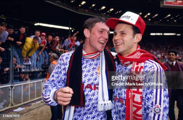 April 1992 Football League Cup Final - Manchester United players Lee Sharpe and Ryan Giggs celebrate victory over Nottingham Forest at Wembley.