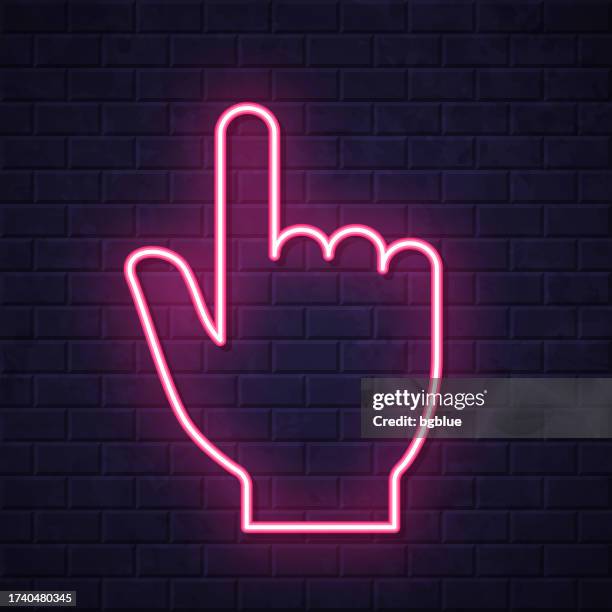hand cursor - pointer. glowing neon icon on brick wall background - touch screen wall stock illustrations