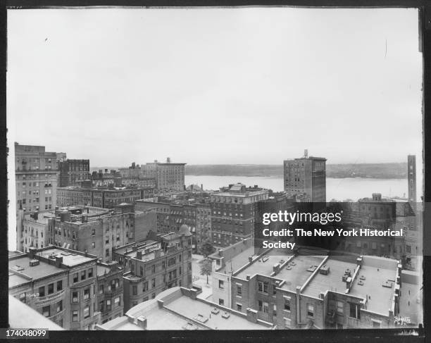 Southwest rooftop view across West 102nd Street, West End Avenue, and the Hudson River to New Jersey, New York, New York, 1920s.