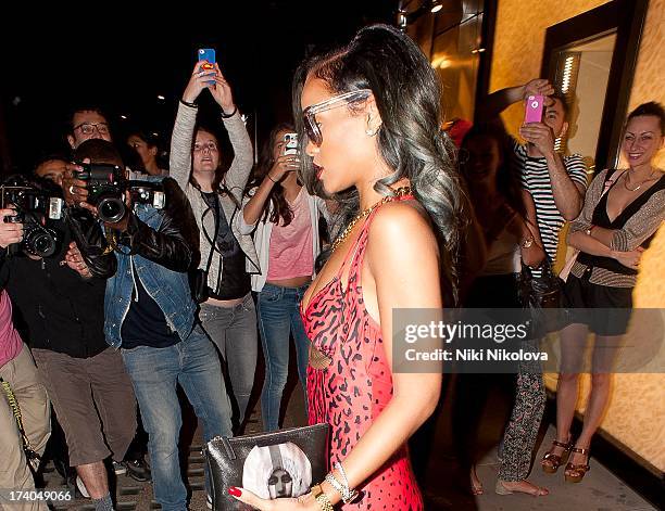 Rihanna leaving roberto Cavalli store, Sloan street on July 19, 2013 in London, England.