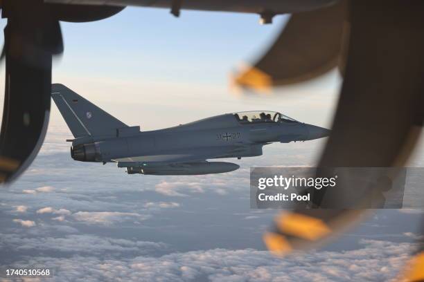 Eurofighter accompanies the flight of German Chancellor Olaf Scholz in an A400M Airbus from BER government terminal to Cologne-Wahn airport between...