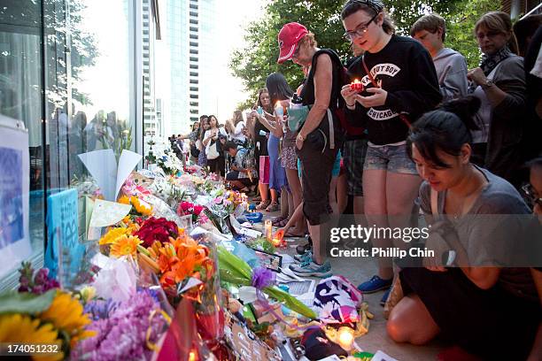 Fans pay Tribute at the Candle Light Vigil for Cory Monteith at the Fairmont Pacific Rim on July 19, 2013 in Vancouver, Canada.