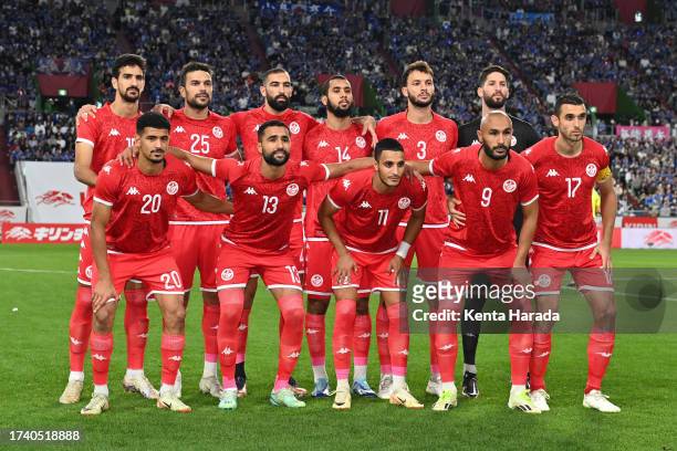 Tunisia players line up for the team photos prior to the international friendly match between Japan and Tunisia at Noevir Stadium Kobe on October 17,...