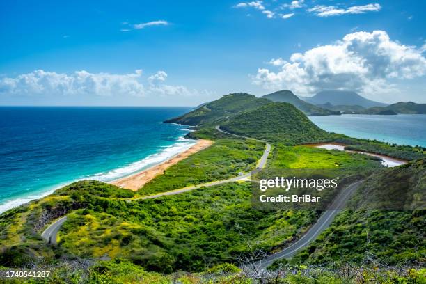 saint kitts panorama with nevis island in the background - nevis stock pictures, royalty-free photos & images