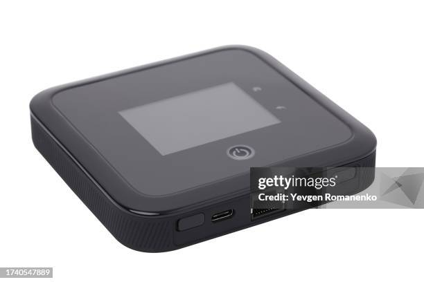 portable wifi router isolated on white background - cargador de móvil fotografías e imágenes de stock