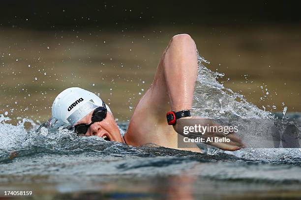 Rebecca Mann of USA competes in the Open Water Swimming Women's 5k race on day one of the 15th FINA World Championships at Moll de la Fusta on July...