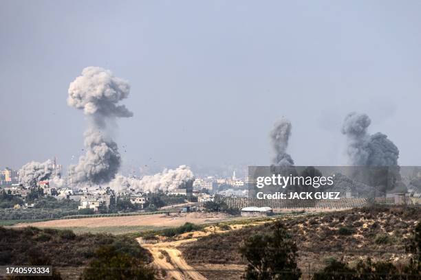 Graphic content / A picture taken from the southern Israeli city of Sderot on October 23 shows smoke and debris ascending over the northern Gaza...