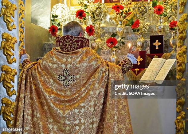 Cleric is seen praying during the mass in Diyarbakir. A small group of Armenians in Diyarbakir, Turkey, celebrated the name day of the Surp Giragos...