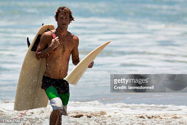 broken scheda - surfboard foto e immagini stock