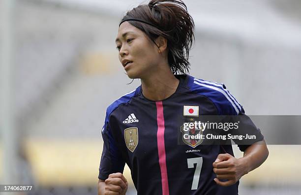 Kozue Ando of Japan reacts during the EAFF Women's East Asian Cup match between Japan and China at Seoul World Cup Stadium on July 20, 2013 in Seoul,...